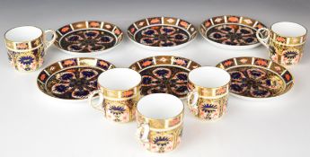 Royal Crown Derby Imari six saucers and five coffee cans decorated in the 1128 pattern