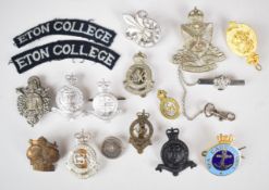 Approximately fourteen university / college cadet badges including Royal Military Academy Sandhurst,