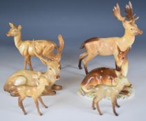 Collection of Beswick deer figures including model 721, tallest 21cm