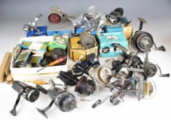 A collection of vintage fixed spool fishing reels including Mitchell 440A and 410x2, boxed Morritt's