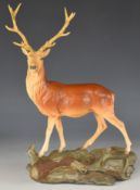 Beswick Connoisseur Collection red deer stag on plinth, height 35cm