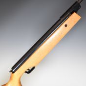 Cometa Model 300 .22 air rifle with semi-pistol grip and sound moderator, serial number 16220-03.