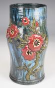 Elton Ware pottery vase with floral decoration in relief, Worlock Collection label to base, height