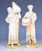 Royal Worcester pair of blush ivory figures of Cairo water carriers, probably designed by Hadley,