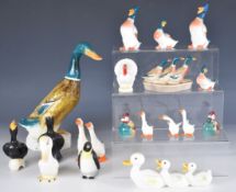 Collection of Beswick and other novelty bird figures including small white turkey, goose family,