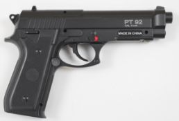 Cybergun PT92 6mm CO2 airsoft pistol with textured grips, multi-shot magazine and fixed sights,