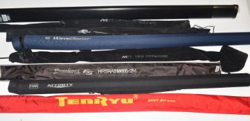 Collection of sea fishing / spinning rods including Challenger Bass Buster 8' 2
