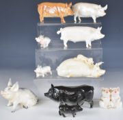 Collection of Beswick pig figures including novelty examples, tallest 8cm