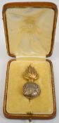 Royal Dublin Fusiliers officer's Glengarry badge with pin back attachment, with box