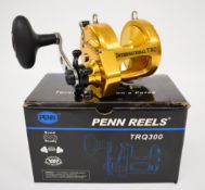 Penn TRQ 300 multiplier fishing reel, boxed with paperwork and accessories, new / unused