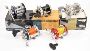 Five Abu Ambassadeur multiplier fishing reels comprising 6500C3, 6500CT, 6500CL3, 6500CT Mag Hi