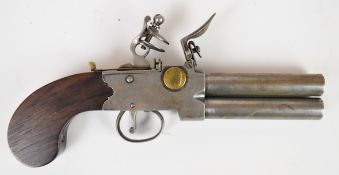 Unnamed flintlock double barrelled over and under tap-action pistol with shaped wooden grip, brass