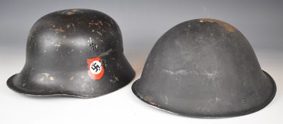 German Nazi fireman's helmet and British Cold War 'turtle' helmet