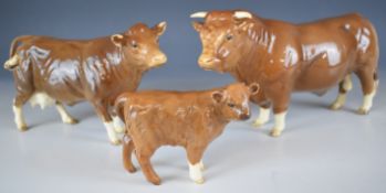 Beswick Collectors Club 1998 Limousin bull, cow and calf figures with BCC backstamps, tallest 12cm
