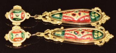 A pair of yellow metal Indian/ Persian earrings each set with two panels of enamel, 6.4cm