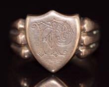 A c1910 9ct rose gold signet ring of shield shape, 5.8g, size P
