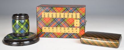 Three tartan ware items comprising Caledonia cribbage board, length 12cm, Gordon match striker and a