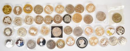 A collection of various crown sized coins and commemorative crowns, £5, etc