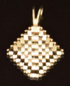 A 14k gold pendant made up of textured links in a diamond shape, 3.1g, 2.8 x 2cm