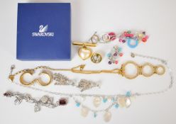A collection of Swarovski jewellery including two necklaces, two bracelets and two pairs of