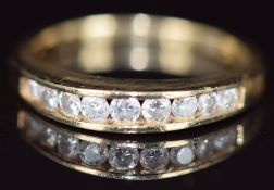 A 14k gold half eternity ring set with graduating round cut diamonds, 3g, size O