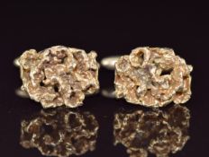 A pair of 9ct gold cufflinks in an abstract design, 15.6g