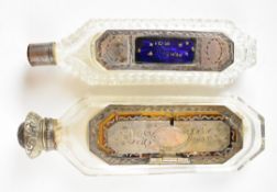 Two 19th century silver mounted cut glass scent bottles, one with blue enamel or similar panel,