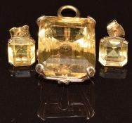 A 9ct gold pendant set with an emerald cut citrine (21.4 x 17.4 x 12.2mm) and a pair of 9ct gold