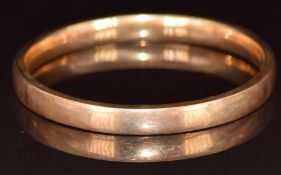 A yellow metal bangle marked 18k, 12.3g, 7cm