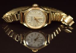 Vertex Revue 9ct gold ladies wristwatch with gold hands and Arabic numerals, silver dial and