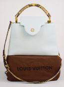 Louis Vuitton Capucines MM leather handbag in pale blue grained leather, with single python skin