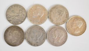Seven Spanish 5 Pesetas coins comprising 1870, 1871, 1877, 1878, 1884, 1892 and 1898 examples