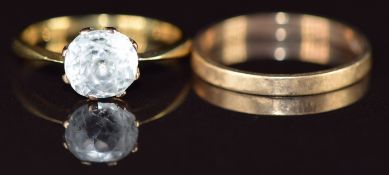 A 9ct gold wedding band (1.3g, size O) and 18ct gold ring set with patste (2.6g, size M)