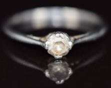 A platinum ring set with a white sapphire, 2.2g, size M