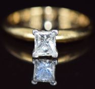 An 18ct gold ring set with a princess cut diamond of approximately 0.5ct, size L