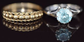 Two 9ct gold rings, one set with a zircon, 5.1g, sizes Q & K