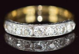 Art Deco 18ct gold ring set with seven old cut diamonds in a platinum setting, each diamond