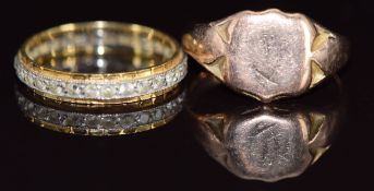 A 9ct rose gold signet ring (with old repair, 3.7g) and a 18ct gold eternity ring (2.2g, size N)