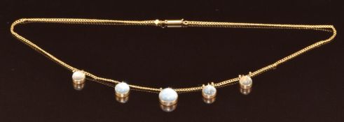 Edwardian 9ct gold necklace set with five moonstone cabochons, 6.3g, 39cm