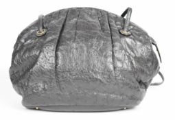 Judith Leiber black ostrich skin bag, length 35cm. Vendor advises her grandmother was very good