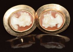 A pair of 9ct gold earrings each set with a cameo, 4.1g