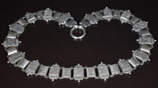 Victorian silver necklace made up of pierced and engraved links, 41g, 44cm