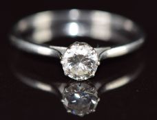A platinum ring set with a round brilliant cut diamond of approximately 0.45ct, 2.1g, size O