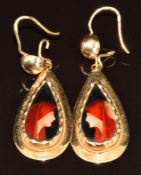 A pair of c1900 yellow metal earrings set with enamel portraits, 9g, 5cm