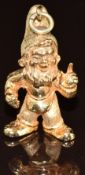 A 9ct gold pendant / charm in the form of a Smurf, 9.7g, 2.5cm