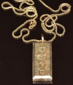 A 9ct gold ingot on 9ct gold chain, 37.3g