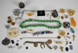 A collection of jewellery including Kenneth Lane earrings, Monet earrings, Miracle pendant, silver