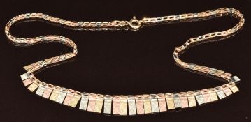 A 9ct gold tricoloured necklace with textured finish, 7.3g, 40cm