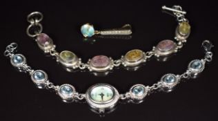 A 9ct gold pendant set with topaz and quartz (4g, 3.8cm), silver watch set with blue topaz and