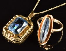 A 14k gold ring set with aquamarine (size M) and a 14k gold pendant set with an emerald mixed cut